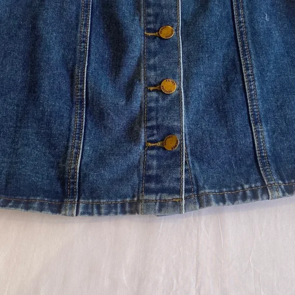 a close up of a blue jean jacket