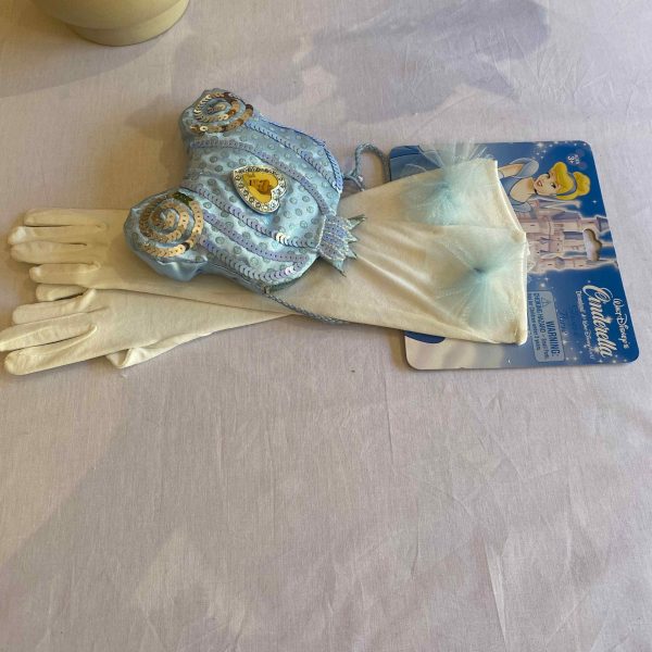 a pair of gloves and a princess garment