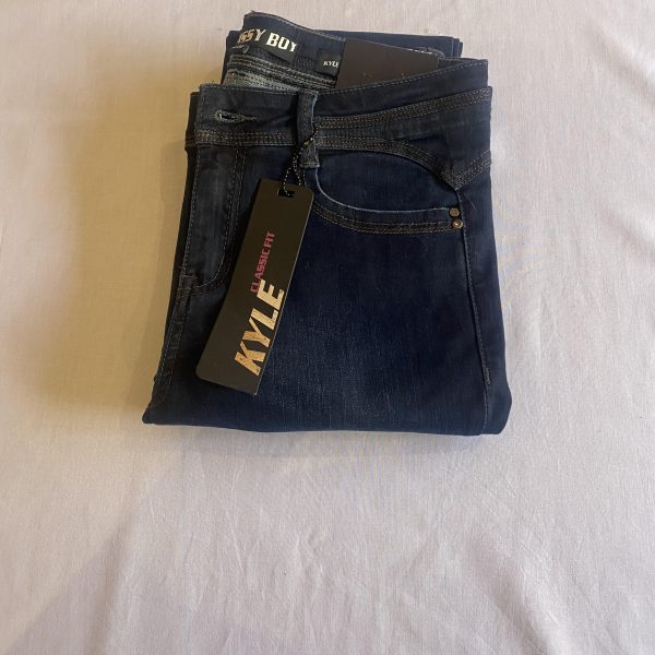 a pair of folded jeans
