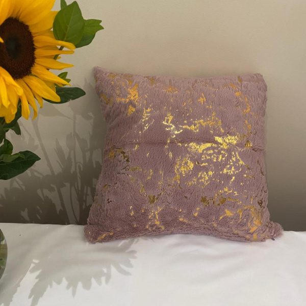 a pillow on a bed